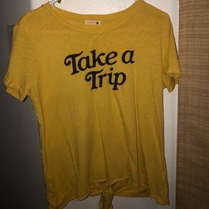Yellow “take a trip” shirt
